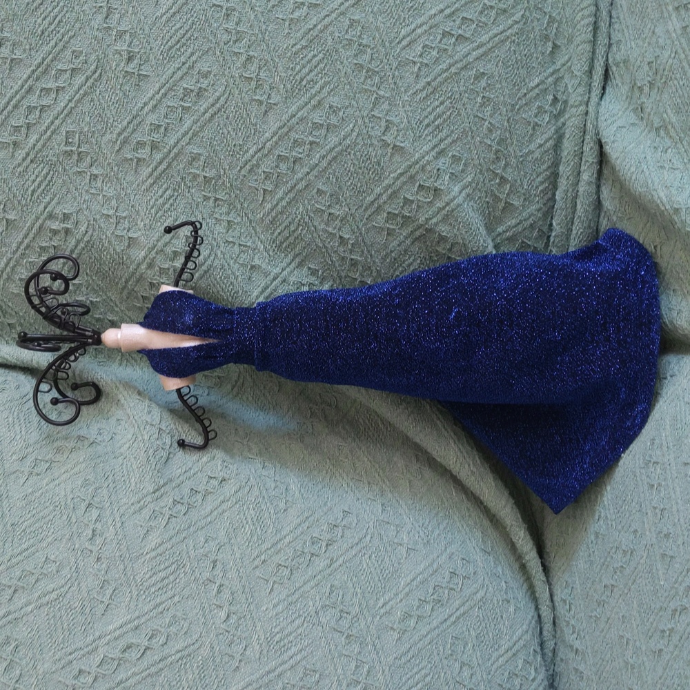A doll jewelry stand.